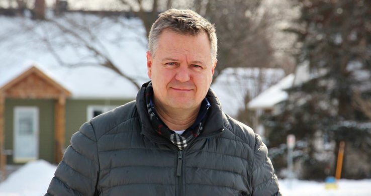 Steve Walsh standing outdoors