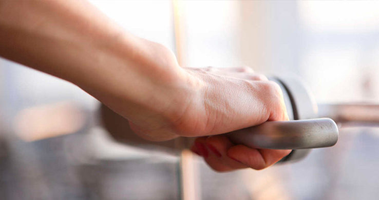 Hand on door handle