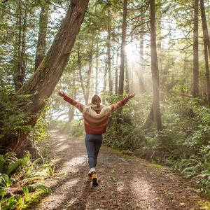 Person enjoying a walk in nature