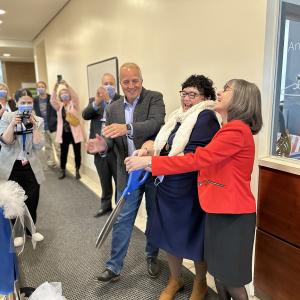 Johannes Ziebarth, Glenda O'Hara and Cynthia Clark cutting the ribbon at the opening of The Hub